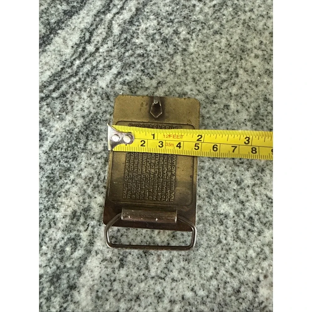 brass‎ belt buckle logos Bendix Corporation and Skagit Car Brake Equipment 1978